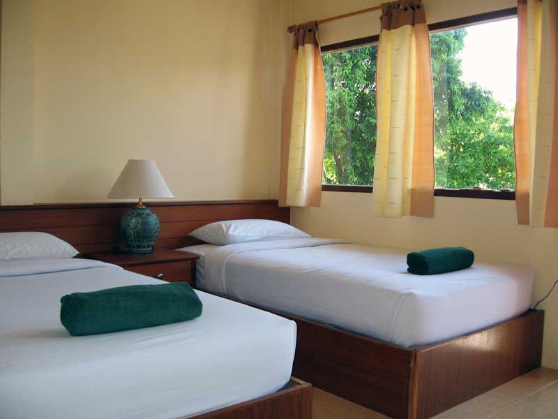 twin bed inside - Utopia Resort