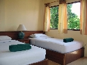 twin bed inside - Utopia Resort